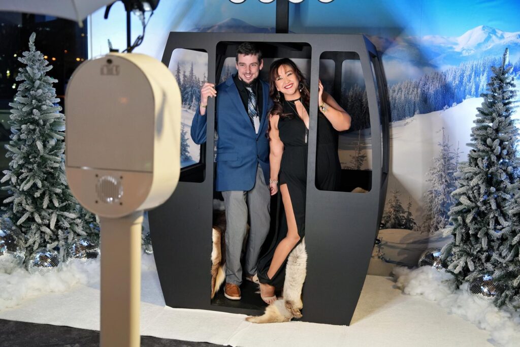 Wedding guests enjoying a photobooth